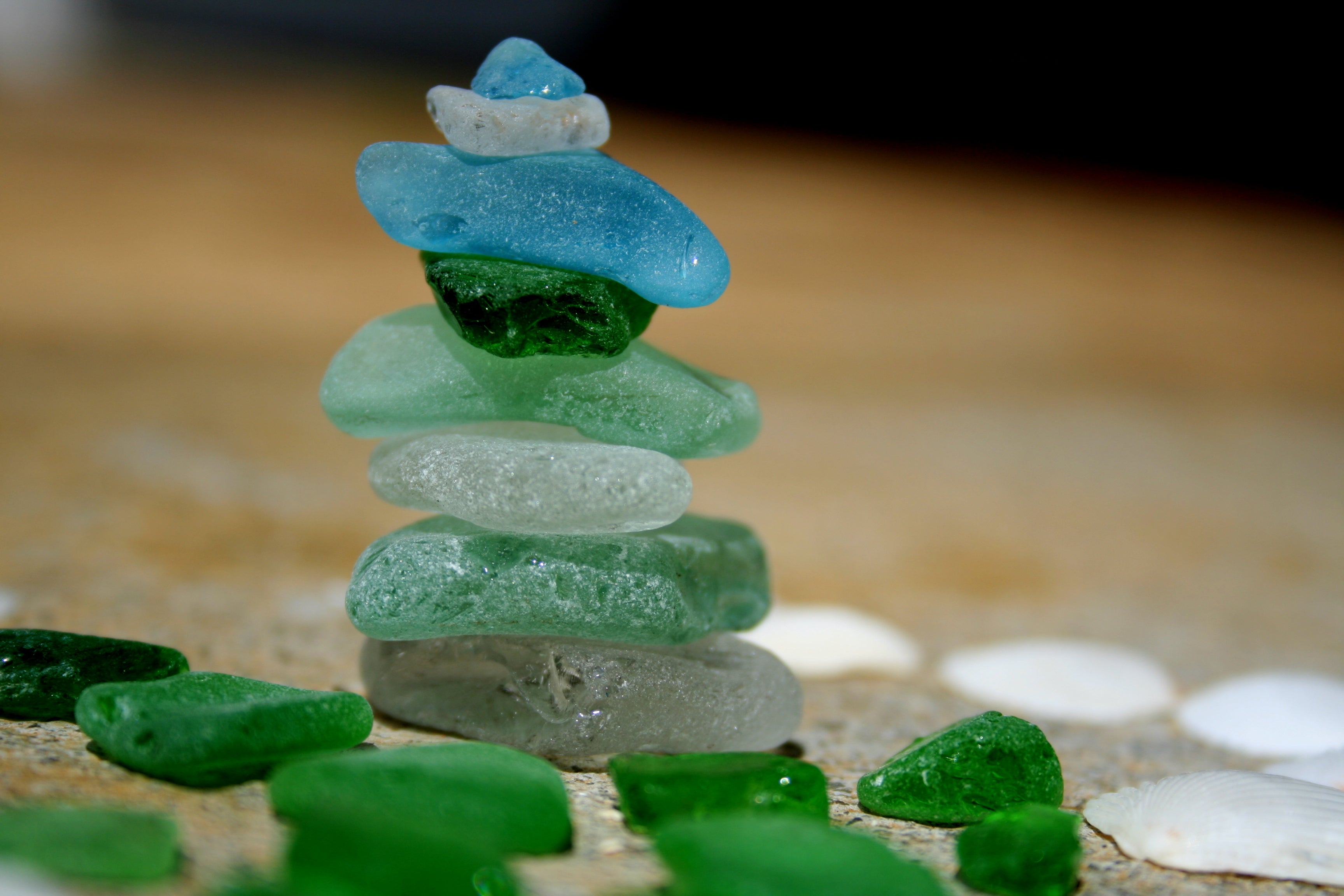 a pile of sea glass of mixed colors